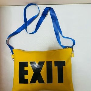 Crossbody, exit print bag. Blue strap included